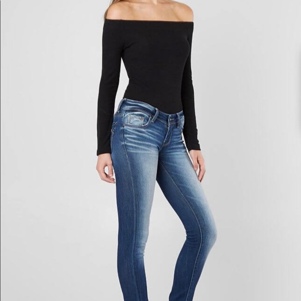 Buckle Black Low Rise Skinny Jeans